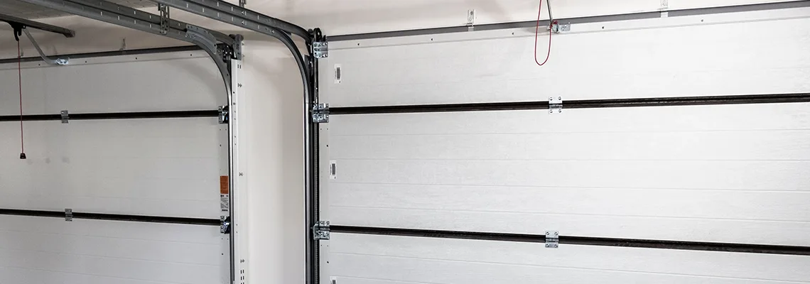 Fix Folding Garage Door Jerking in Coral Springs, Florida