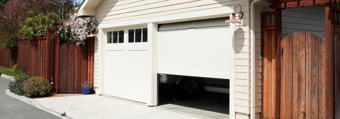 Fix Metal Garage Door Jerking in Coral Springs, Florida